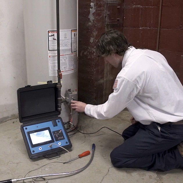 Our plumber runs diagnostics on a water heater here in Niagara Falls, New York.