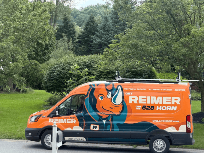 A Reimer manager answers the phone to help a local customer with their HVAC repairs in Buffalo, NY.